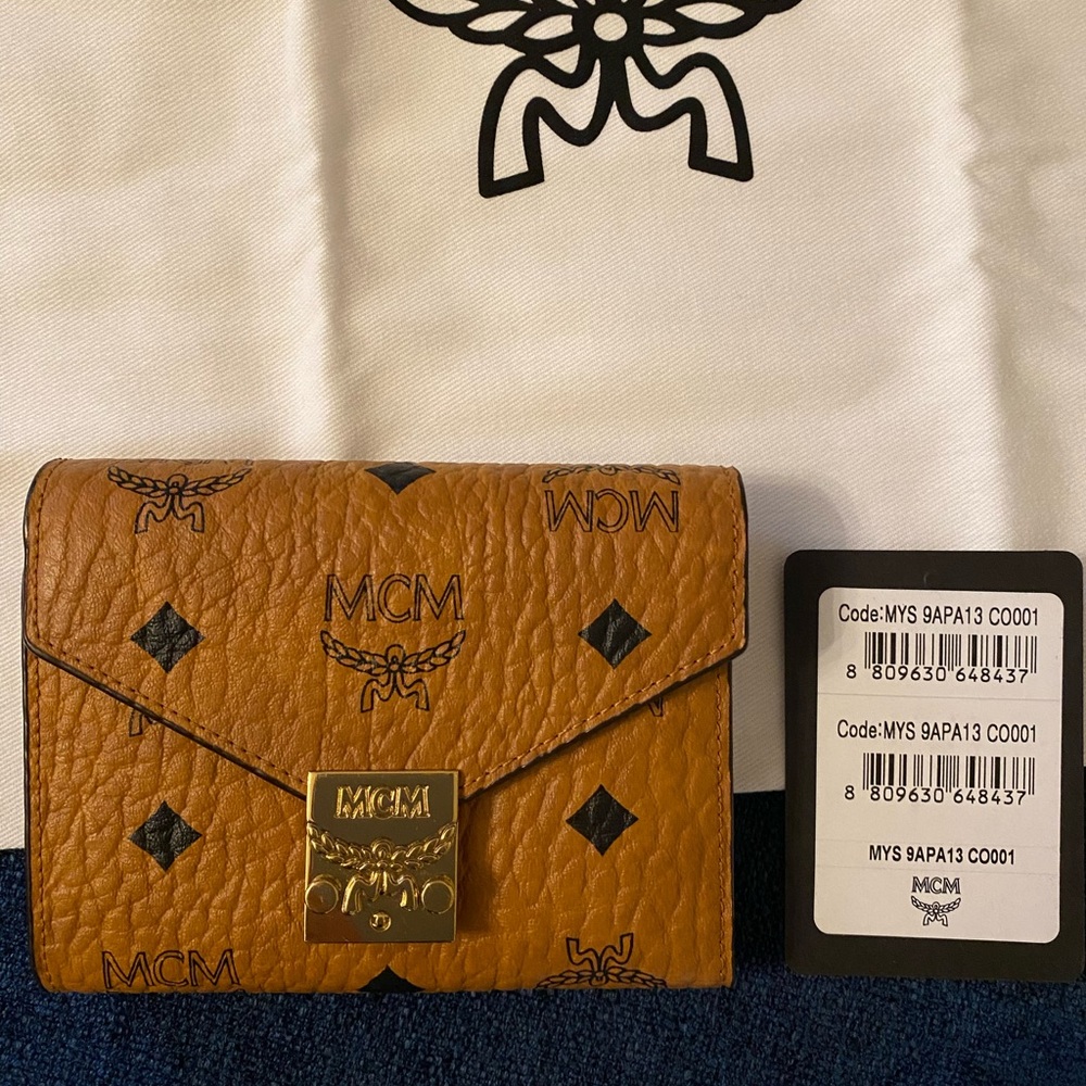 Authentic MCM Logo Printed Wallet with tags and box, excellent condition